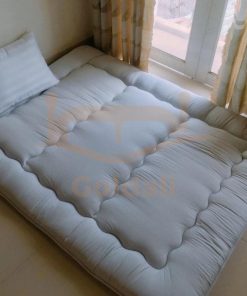 Mattress topper softener